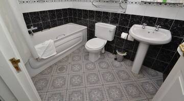Фото номера Семейный номер Отель Bay View Hotel г. Киллибегс 3